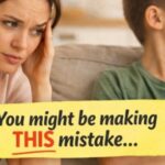 parent talking to child who is not listening and looking away
