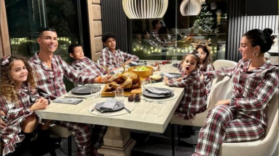Cristiano Ronaldo and Georgina Rodríguez with their children, showing a happy and grounded family moment